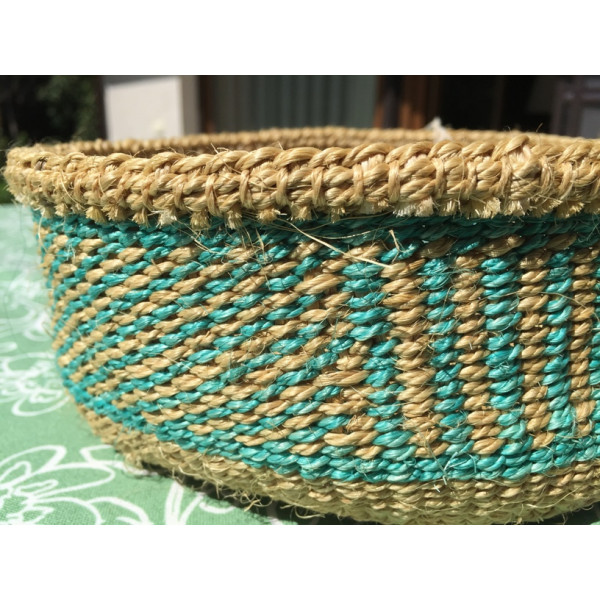 Wicker bread basket made of natural material, round, turquoise  pattern